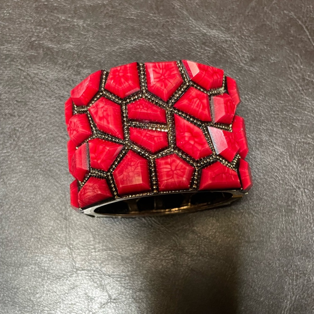 Red shell hinge statement cuff